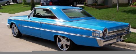 1963 Ford Galaxie - This 1963 Ford Galaxie coupe is painted bright blue and sits on custom chrome wheels.