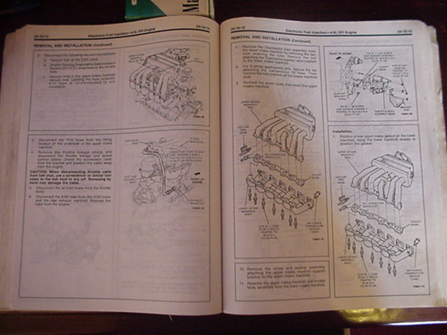 4.9L EFI engine upper and lower intake manifold removal and installation pages with exploded views