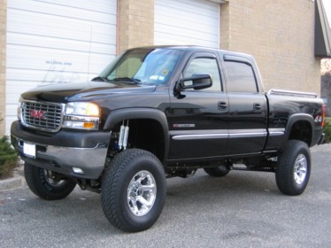 1994 Ford Bronco - Cousin Kevins 02 2500HD we lifted it 6" and put on some 35"s on 17" rims .