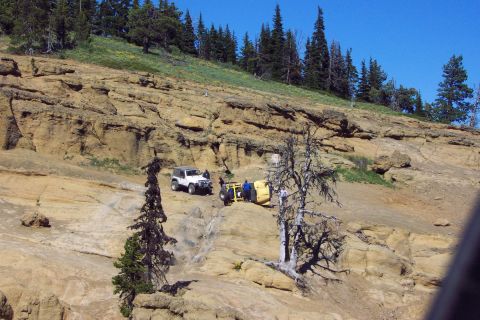 1996 Ford Bronco - Hip Flops onto Side as Reaching Top of Funny Rocks Notch. (6/26/2004)