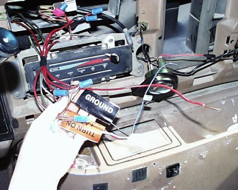 1988 Ford E250 - Close-up of vehicle interior wiring, showing labels for 'GROUND' and 'TURN ON'.