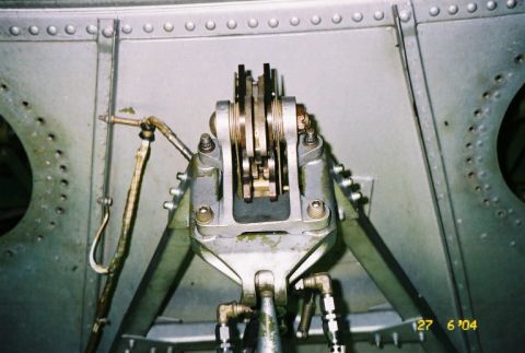 1988 Ford Bronco - Detail of the complex mechanical assembly for an aircraft's landing gear system.