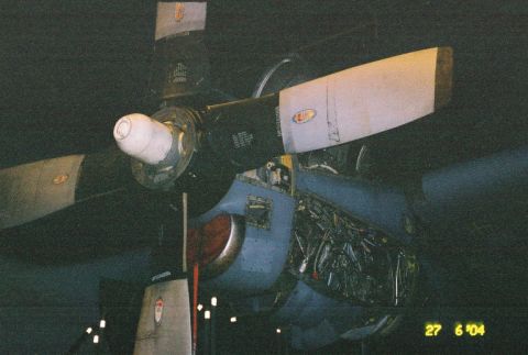 1988 Ford Bronco - Close-up view of an airplane's propeller and engine components, revealing intricate mechanical details.