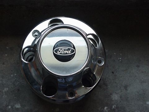 1993 Ford Bronco - fixed my center cap after i noticed that it was cracked. i cut .060 mirrored stainless steel circles one 1/4" or so bigger then the other.…