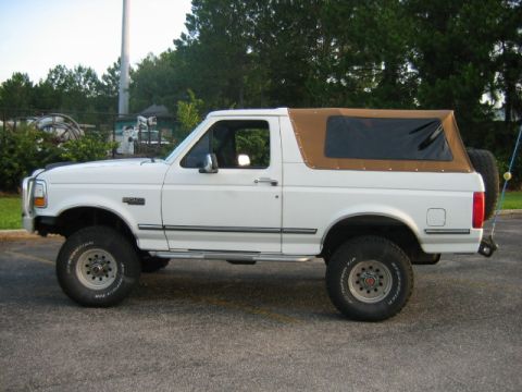 1992 Ford Bronco - This 1992 Ford Bronco is equipped with a removable soft top, offering an open-air driving experience.