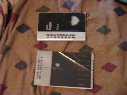 Eagle Vision owner's manual and warranty information booklets on a blanket