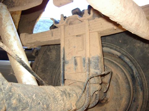 1985 Ford Bronco - The right side before the shackle flip with the Skyjacker lift block on top of the factory wedge block.