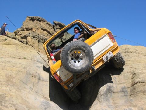 1995 Ford Bronco - Ouch. Tony totally wedged in and stuck. A two winch pull and he was good to go.