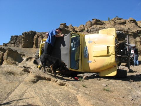 1995 Ford Bronco - Hip made it up V notch, but right on exiting, just too much angle, and over she went. Rocky comes in to investigate if there is any food sp…
