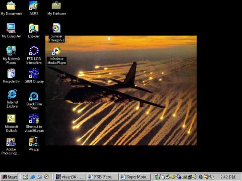 1988 Ford Bronco - Desktop wallpaper displays a military transport plane deploying flares against a sunset sky.
