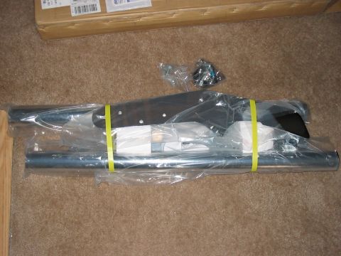 1988 Ford Bronco - Unopened running boards are packaged for transport, ready for installation.