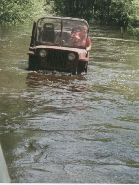 1980 Ford Bronco - THAT is some deep water! (And my favorite part is the trickle of water coming off the fender from the fan!)