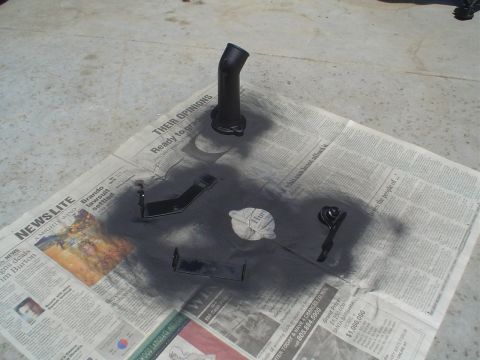 1993 Ford Taurus - a few brackets from the engine compartment were rusty, sanding a paint will fix that.