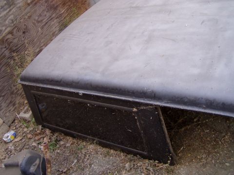 1967 Ford Bronco - This black metal storage box appears to be an aftermarket accessory or custom fabrication.