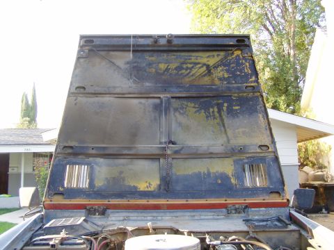 1967 Ford Bronco - Underside of an open hood, showing wear and tear. Supermotors.net logo visible.