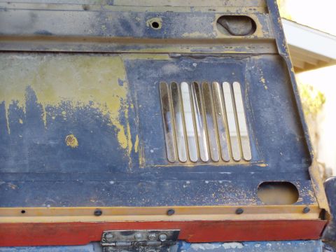 1967 Ford Bronco - Close-up of a vehicle's hood vent, showing signs of age and wear.
