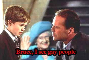 1995 Ford Bronco - A still from a movie shows a man speaking to a child, with another person blurred in the background.