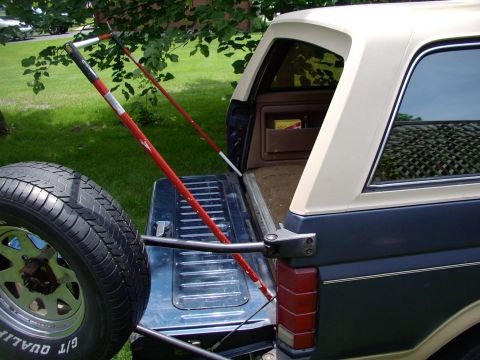 1986 Ford Bronco - How about now ? Without the traditional flip up camper lid there's nothing to hold the tent up, so this does nicely and is infinately adjus…