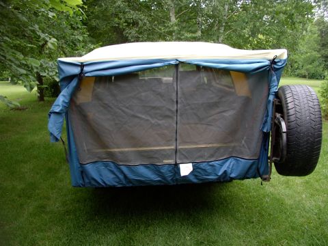 1986 Ford Bronco - Step back and tie up the flaps to expose the zipped mosquito netting.
