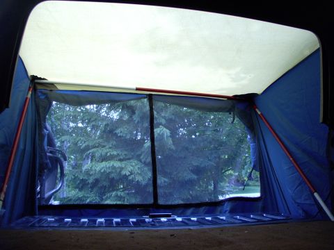 1986 Ford Bronco - There she is in all her rain and mosquito free glory. Extra sleeping space for us tall guys !