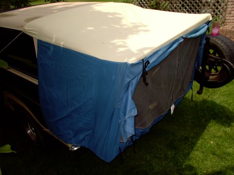 1986 Ford Bronco - Aerial view of the tailgate tent. Now you can spend some time tugging and tightening the tent to make it more taut and attractive, but fran…