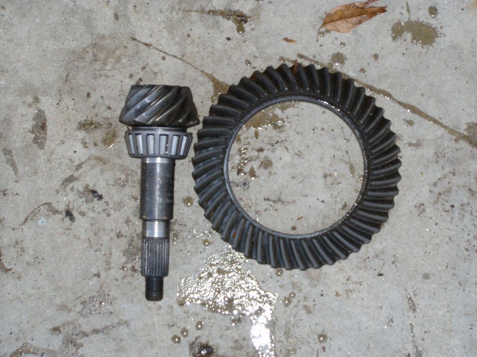Differential ring gear and pinion gear set laid on wet concrete