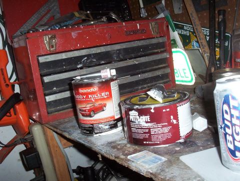 1989 Ford Bronco - regular pinkish bondo on the left and then the "finishing" bondo kinda like primer and finishing coat i geuss