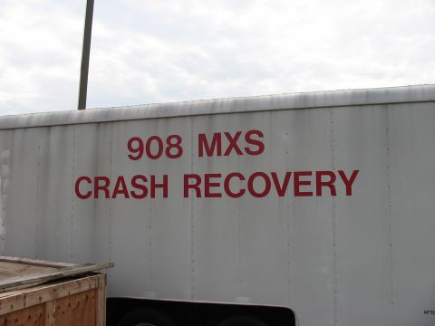 1988 Ford Bronco - Trailer with '908 MXS CRASH RECOVERY' text visible on its side.