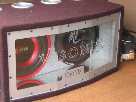 1988 Ford Bronco - Car subwoofer enclosure with Visonik speakers, one red trim.