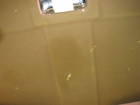 1988 Ford Bronco - Close-up of a vehicle's interior panel, showing wear and tear.
