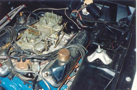 1967 Ford Fairlane - Close-up view of a modified V8 engine with dual carburetors and custom wiring.