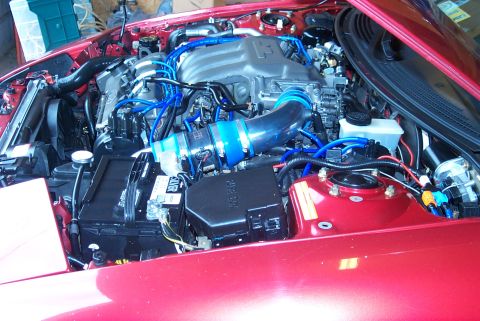 1996 Ford Probe - Engine bay details with custom modifications visible.