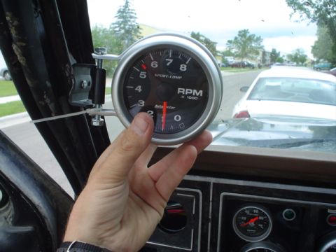 1981 Ford Bronco - another shot of the tach. where its gonna be mounted when the JB weld drys all the way.