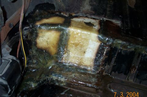 1986 Ford Bronco - Passenger side after welded patched are covered with fiberglass and resin.