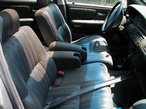 1997 Ford Taurus - Interior view of a car, showing the front seats and dashboard.