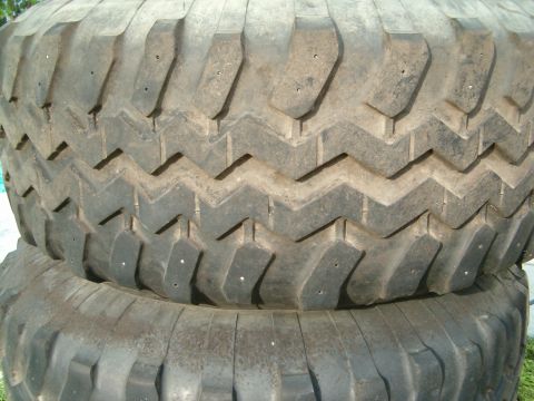 1991 Ford Bronco - This image shows a close-up of a tire with a tread pattern and studs, not a 1991 Ford Bronco.