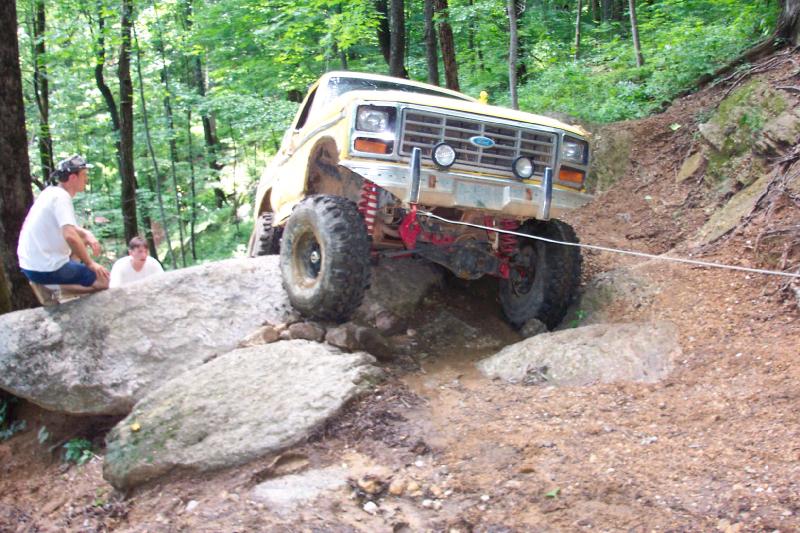 Front view of high centered on rock.