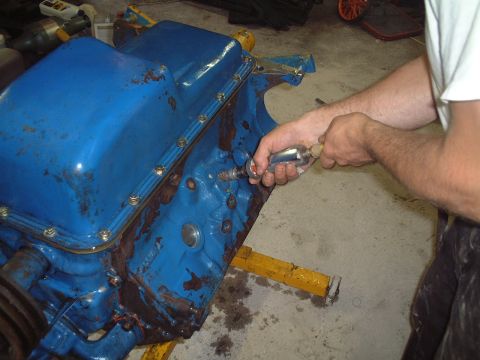 1967 Ford Galaxie - Stripping paint from the freeze plugs.