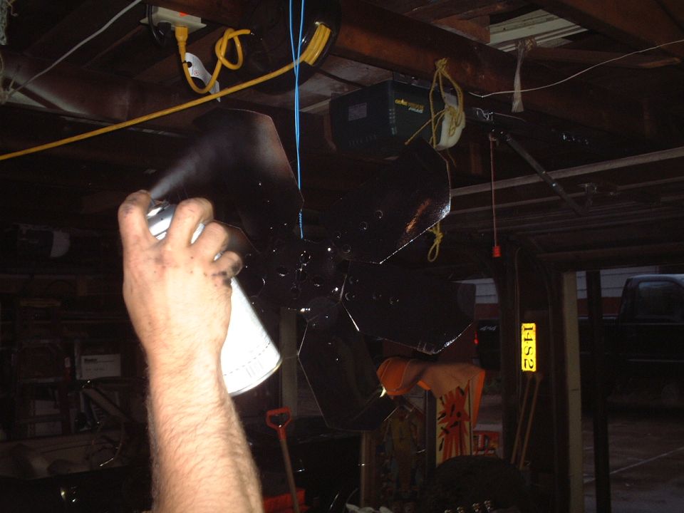 Painting the fan.