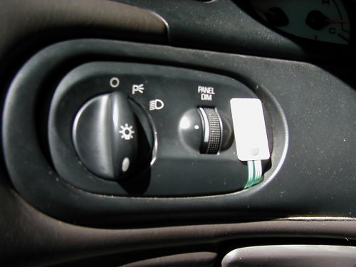 car's headlight switch and panel dimmer knob