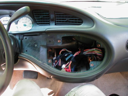 1997 Ford Taurus interior showing open center console with wiring harness exposed
