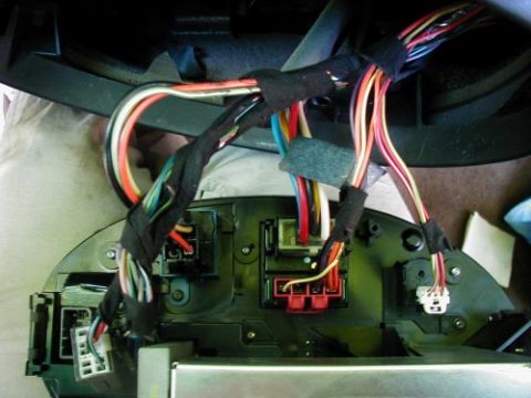 1997 Ford Taurus - Wiring harness and connectors are visible, suggesting access to internal vehicle electronics.