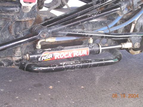 1994 Ford Bronco - The photo shows a close-up of an AGR Rock Ram steering stabilizer, not a 1994 Ford Bronco.