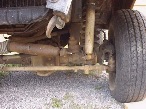 1988 Ford Bronco - Front axle and suspension parts are visible in this close-up shot.