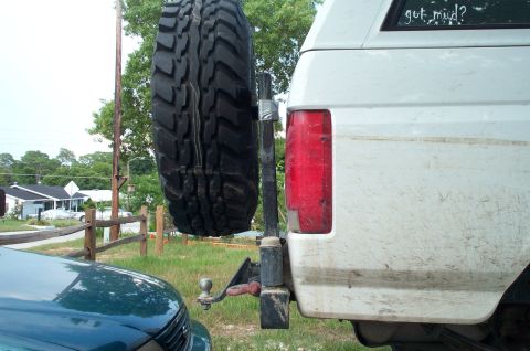 1995 Ford Bronco - the tire carrier got deflected away from the tailgate from my friend hanging on the spare while trying to hook up two winch cables to the c…