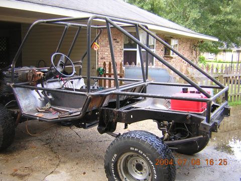 1984 Chevrolet Blazer - This custom buggy frame features a full roll cage and a red gas can mounted in the rear bed.