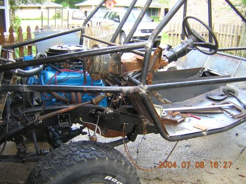 1984 Chevrolet Blazer - This custom buggy features a blue engine and a prominent roll cage, with a date stamp of 2004.