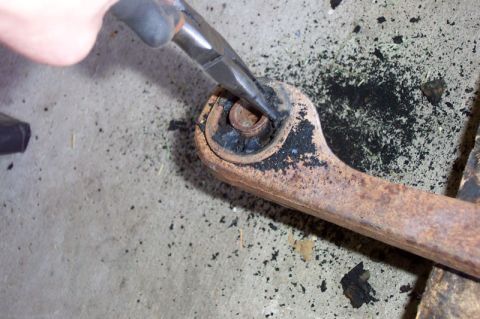 1968 Ford F-100 - Step 2--pull out as much of the remaining bushing as possible with pliers so that there's less work to do in the next step.
