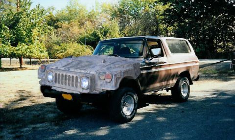 1981 Ford Bronco - This modified Ford Bronco features a unique front end conversion, blending its original body with a Hummer-inspired grille and headlights.