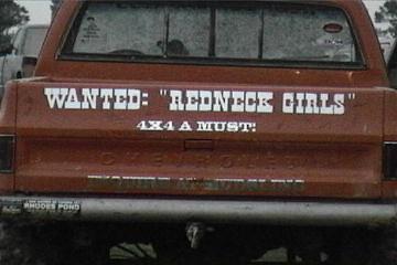 1989 Ford Bronco - Pickup truck tailgate displays custom text and branding, indicating it is a Chevrolet.
